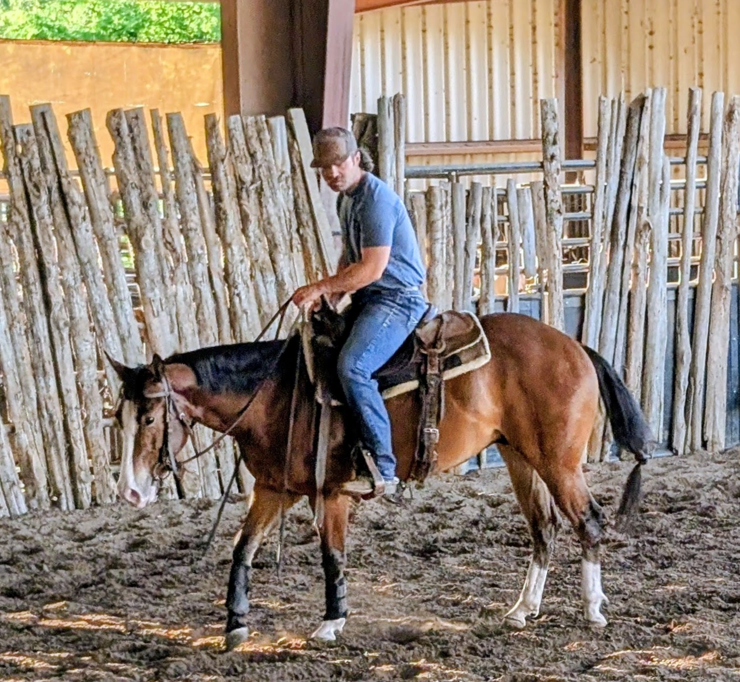 Rudie and Isaac Nulton in the fence arena